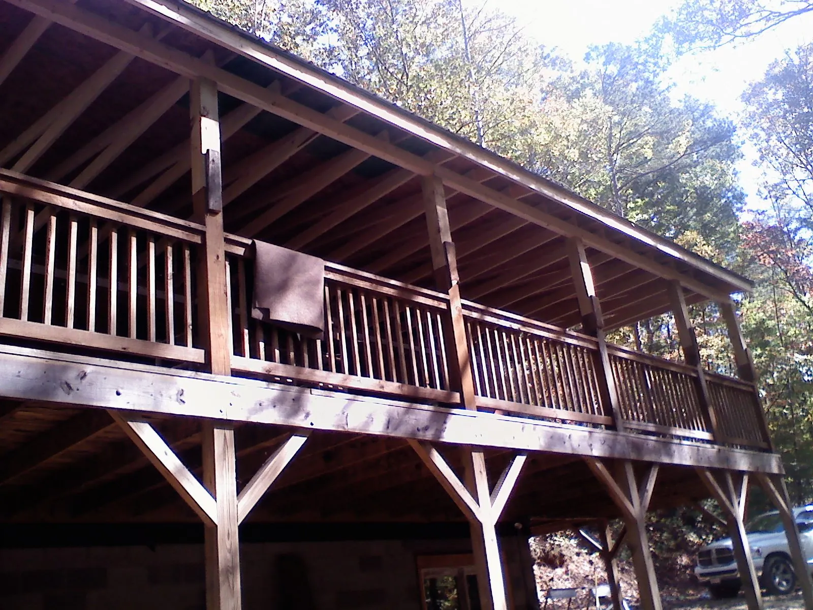 Timber framing under a new elevated porch and deck — Roof Leak Repair in Charlottesville by Roofing Brothers